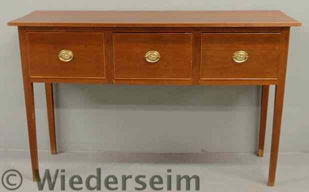 Appraisal: Southern style Hepplewhite cherry sideboard with a one-board top with