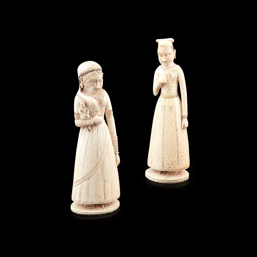 Appraisal: Y PAIR OF COMPANY SCHOOL IVORY FIGURES INDIA TH CENTURY