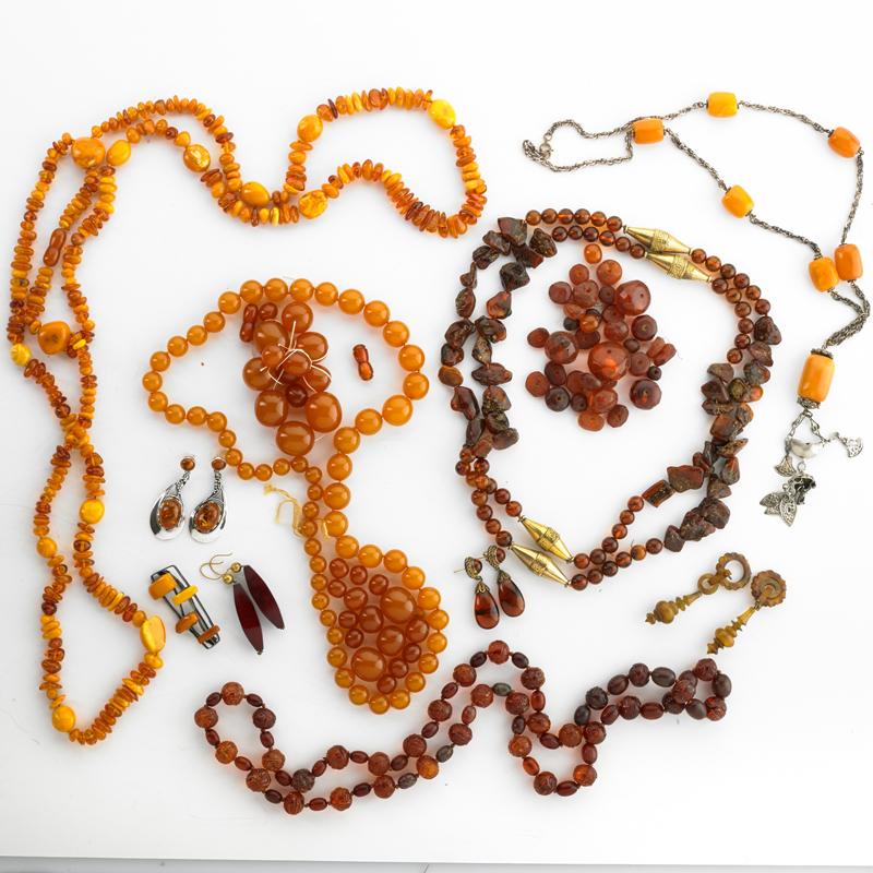 Appraisal: ASIAN AND BALTIC AMBER COLLECTION Numerous elements in butterscotch translucent