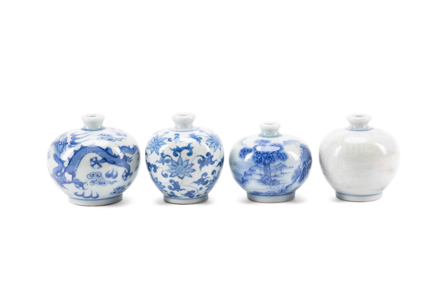 Appraisal: FOUR CHINESE BLUE WHITE PORCELAIN SNUFF BOTTLES Four Chinese blue