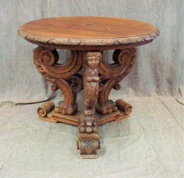 Appraisal: Victorian Carved Walnut Center Table with Figural Carving on Base