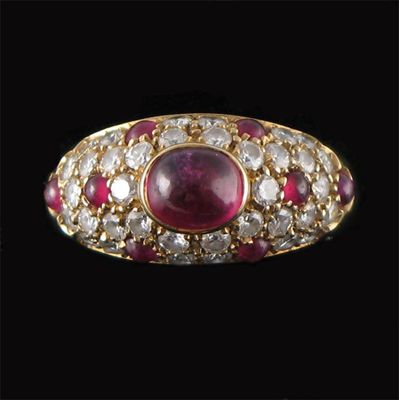 Appraisal: A ruby and diamond ring by Cartier centred with an