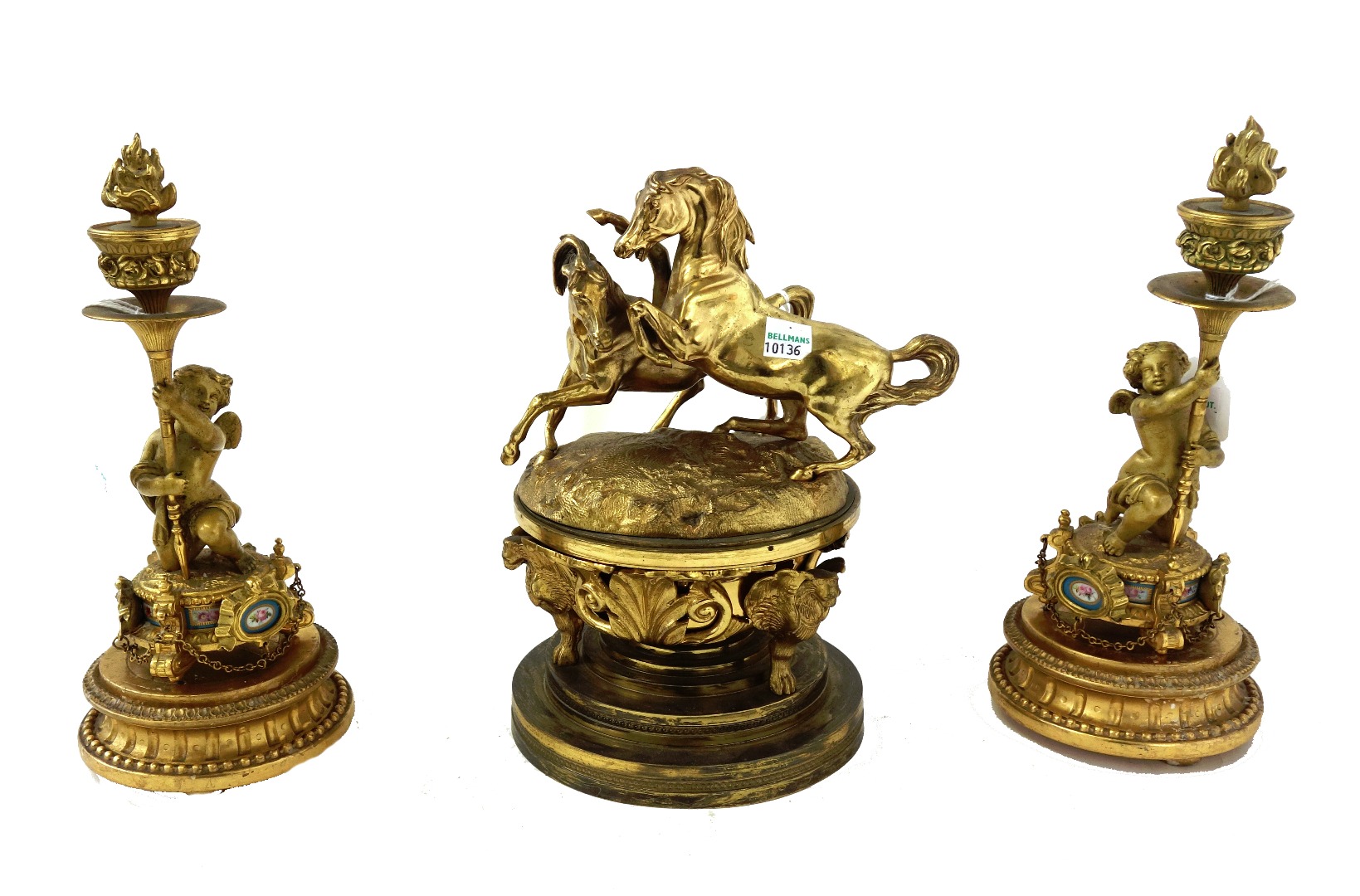 Appraisal: A pair of modern gilt metal figural candlesticks each with