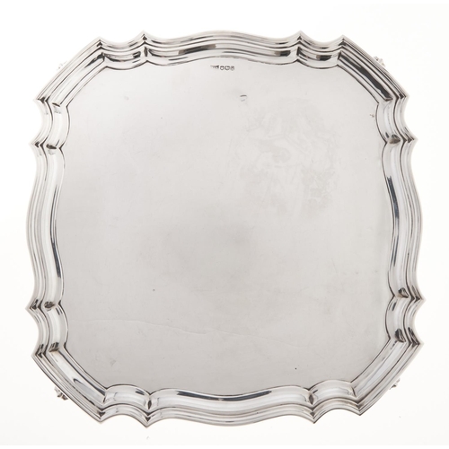 Appraisal: An Elizabeth II shaped square silver salver the plain field