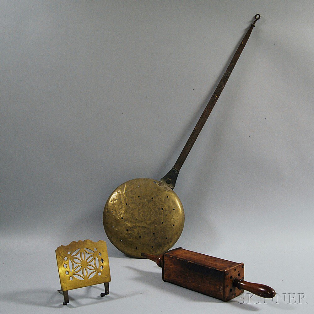 Appraisal: Bellows a Pierced Brass Trivet and a Wrought Iron and