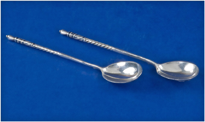 Appraisal: A Pair Of Russian Silver Spoons Silver And Niello Spoons