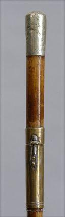 Appraisal: ROYAL ARMY SERVICE CORPS BRASS-MOUNTED WOOD WALKING STICK WITH SILVER-PLATED