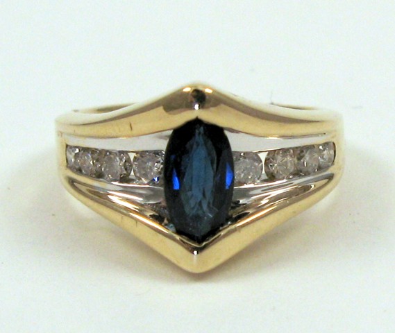 Appraisal: SAPPHIRE DIAMOND AND YELLOW GOLD RING The k gold band