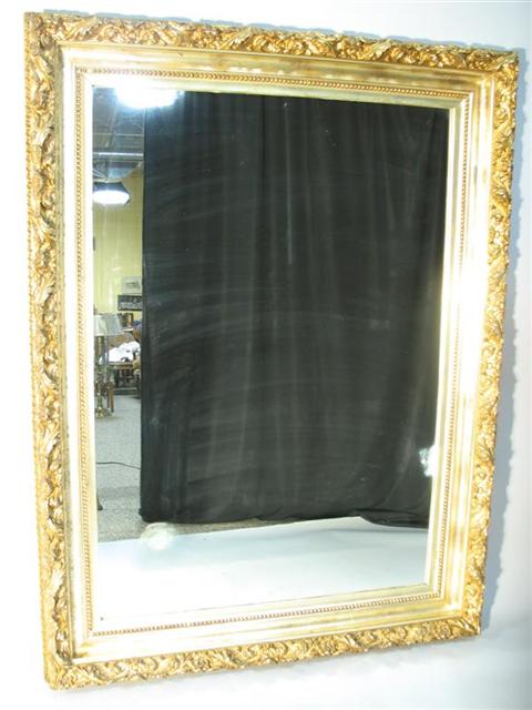 Appraisal: LARGE CLASSICAL GILTWOOD FRAME WITH MIRROR the rectangular mirror with