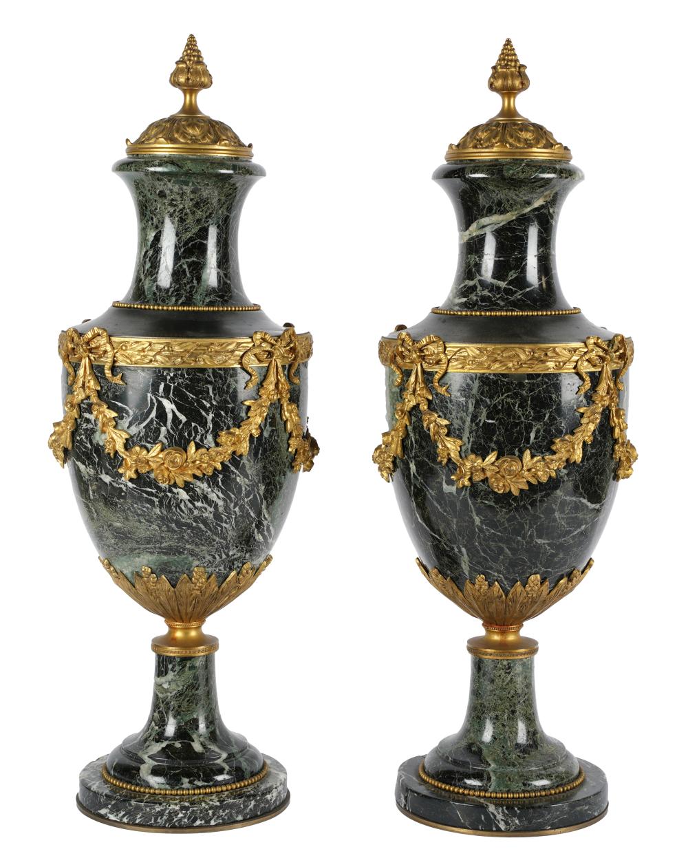 Appraisal: PAIR OF MARBLE GILT METAL-MOUNTED URNSProvenance Property from the Collection