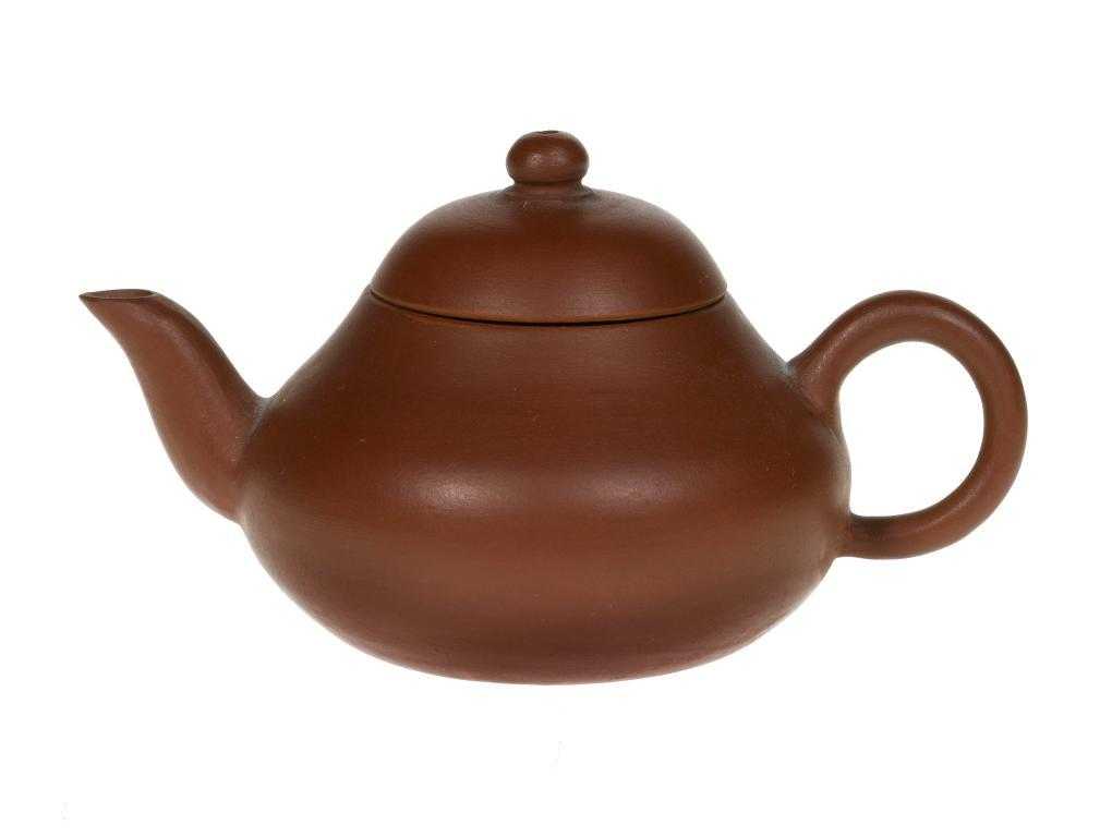 Appraisal: A YIXING STONEWARE TEAPOT AND COVER of compressed form with