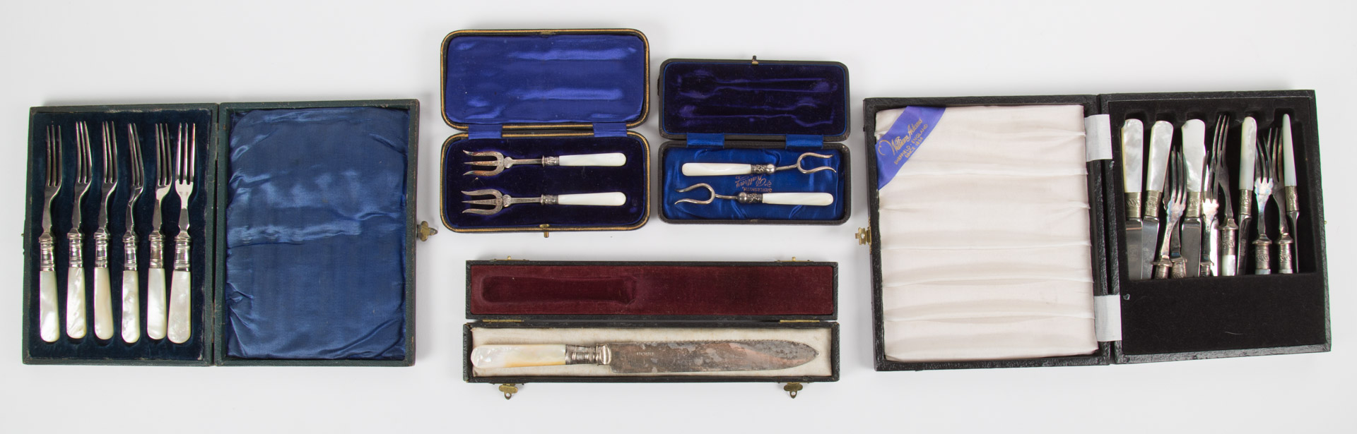 Appraisal: Five cased mother-of-pearl items including cased flatware sets and a