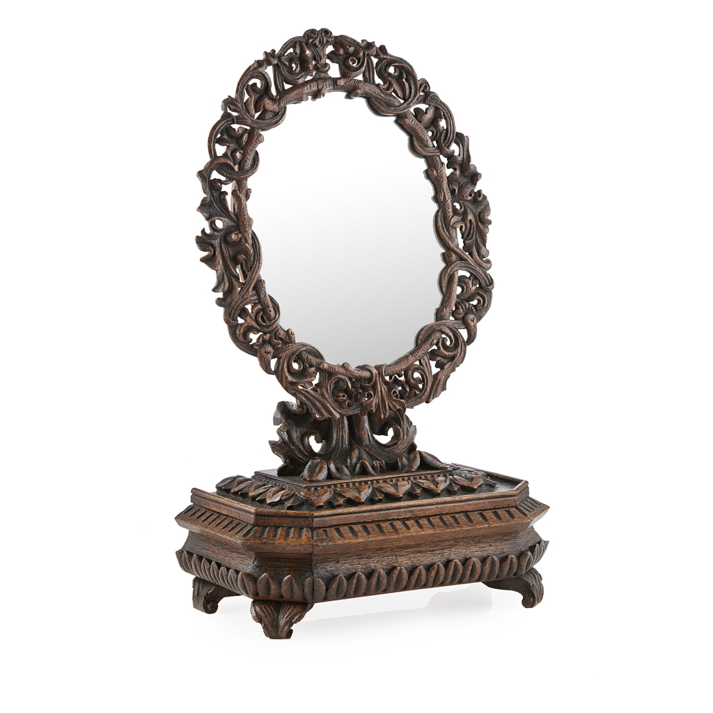 Appraisal: ANGLO-INDIAN CARVED TOILET MIRROR LATE TH CENTURY the pierced and