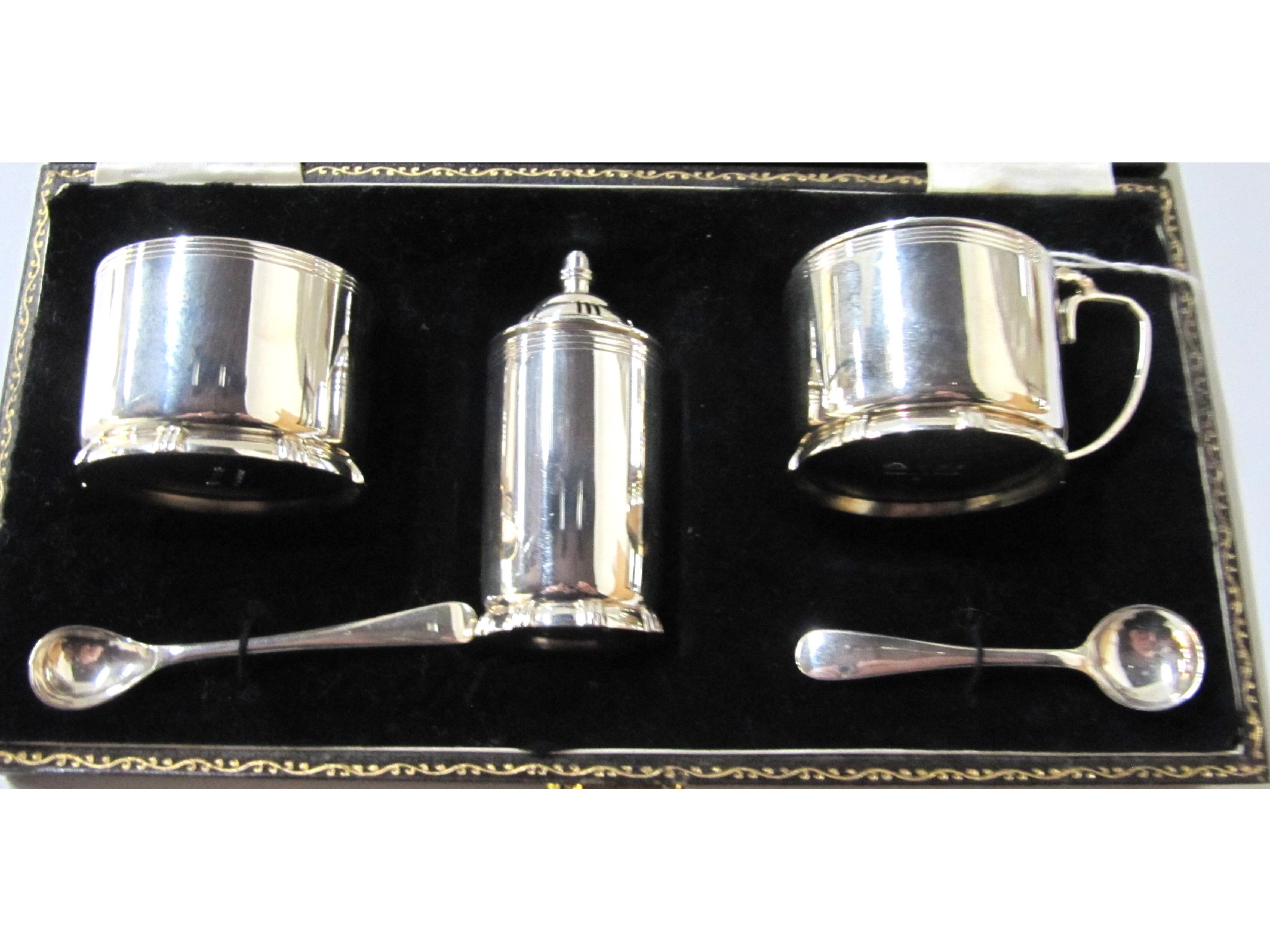 Appraisal: A cased three piece silver condiment set Birmingham