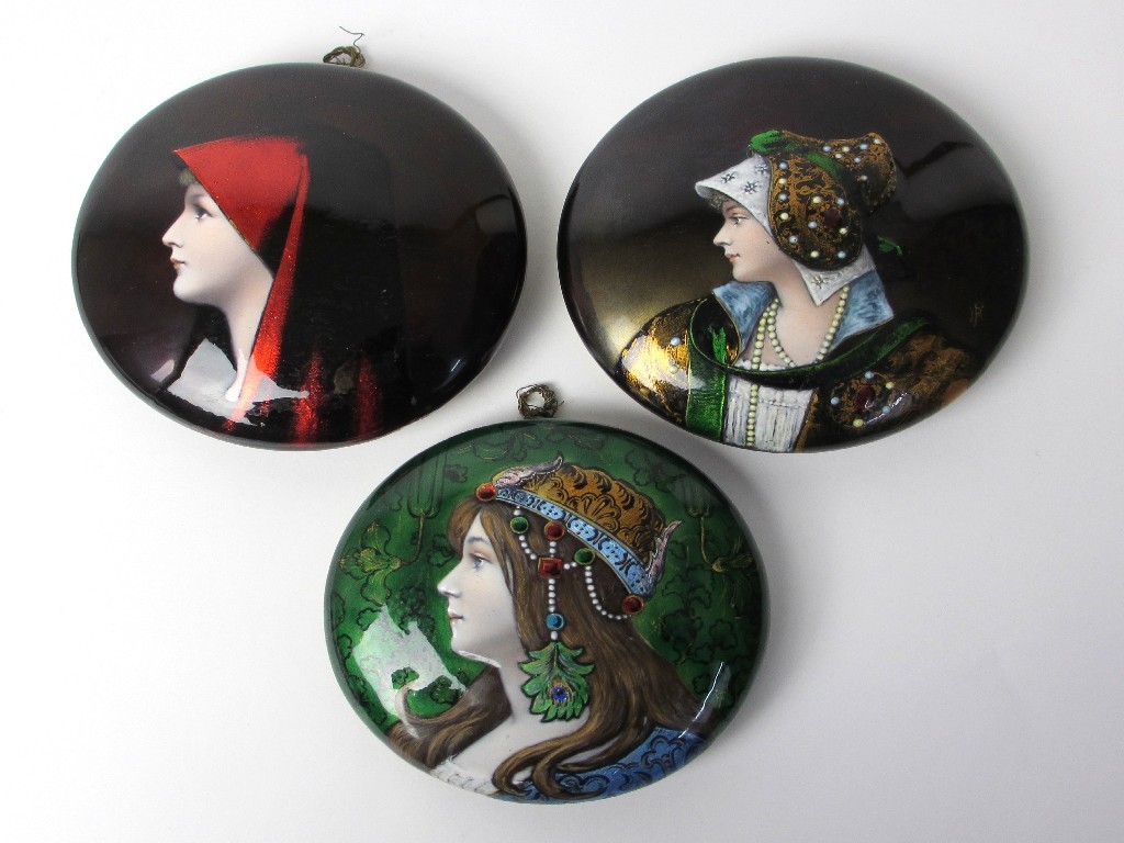 Appraisal: Three Limoges enamel plaques decorated with a female profile portrait