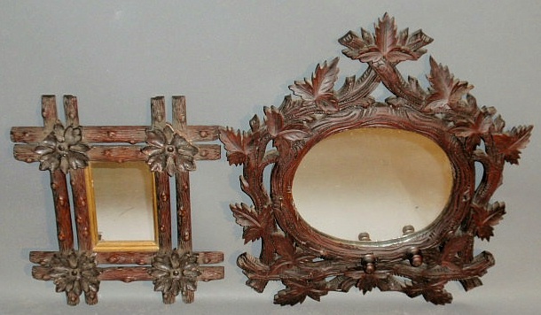 Appraisal: Black Forest carved mirror late th c and another example