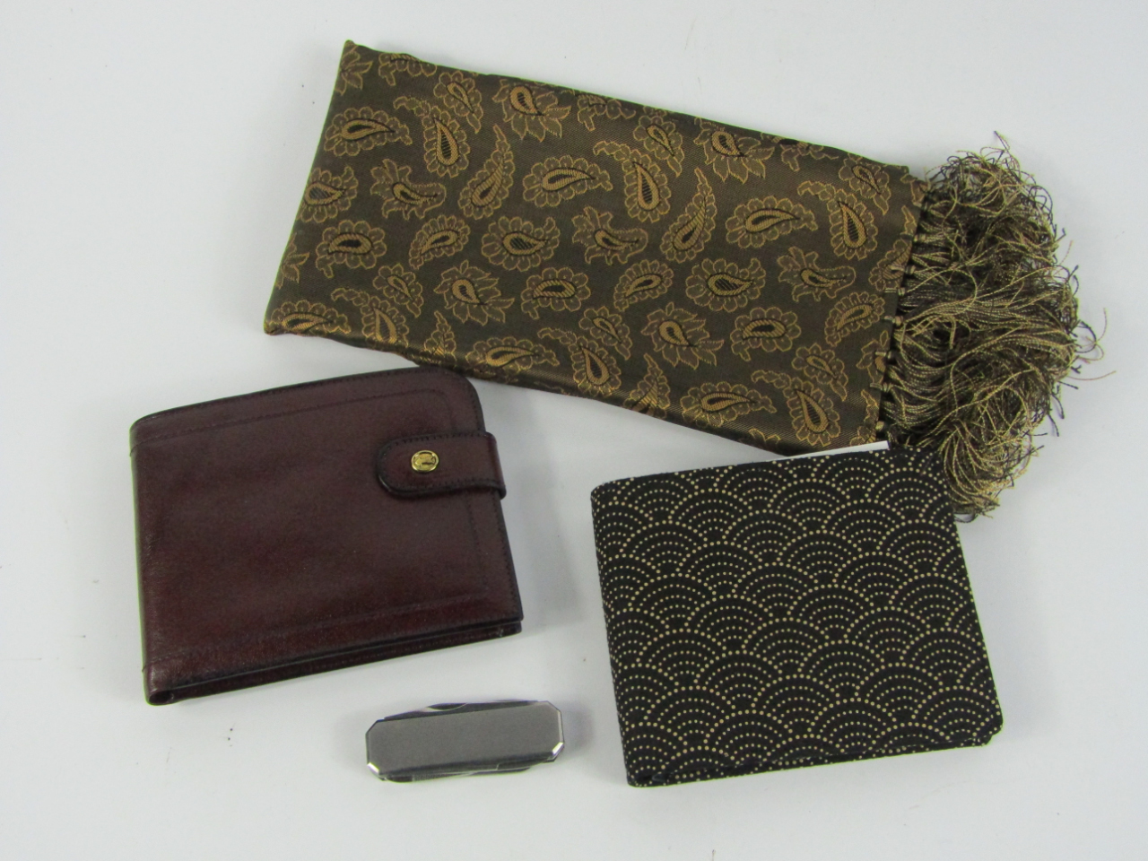 Appraisal: A Neiman Marcus pocket knife two wallets boxed and a