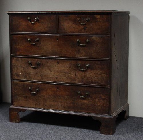 Appraisal: A George III mahogany chest of two short and two