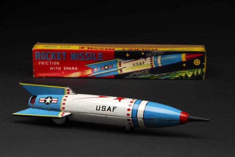 Appraisal: USAF Rocket Missile Toy Description Japanese Working but needs flint