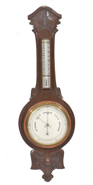 Appraisal: AN EARLY TH CENTURY ANEROID WHEEL BAROMETER the silvered dial