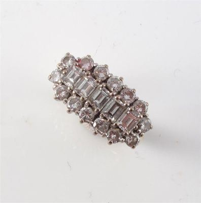 Appraisal: A diamond cluster ring Set with a line of five