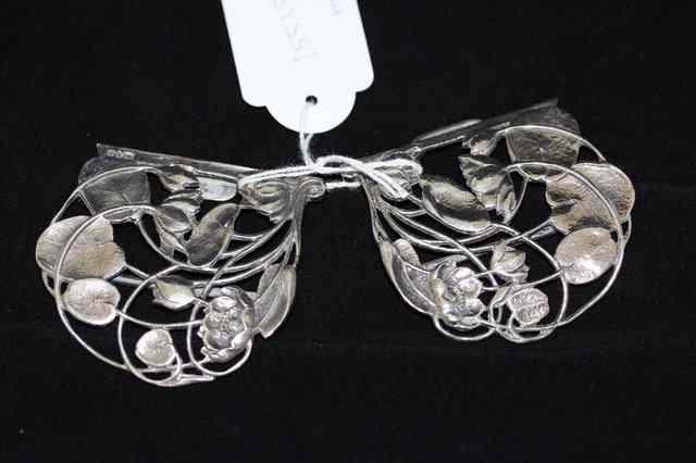 Appraisal: A LATE VICTORIAN SILVER BELT BUCKLE delicately made in the