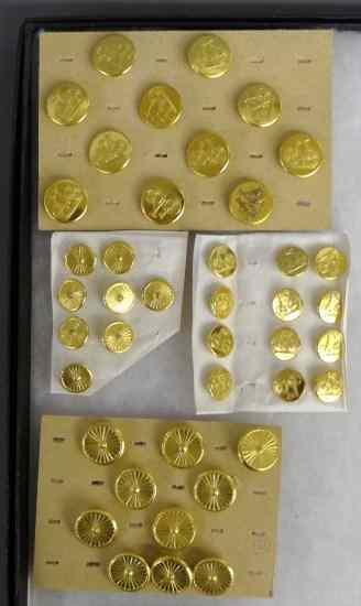 Appraisal: Collection of brass Wheelmen uniform buttons '' safety '' spoked