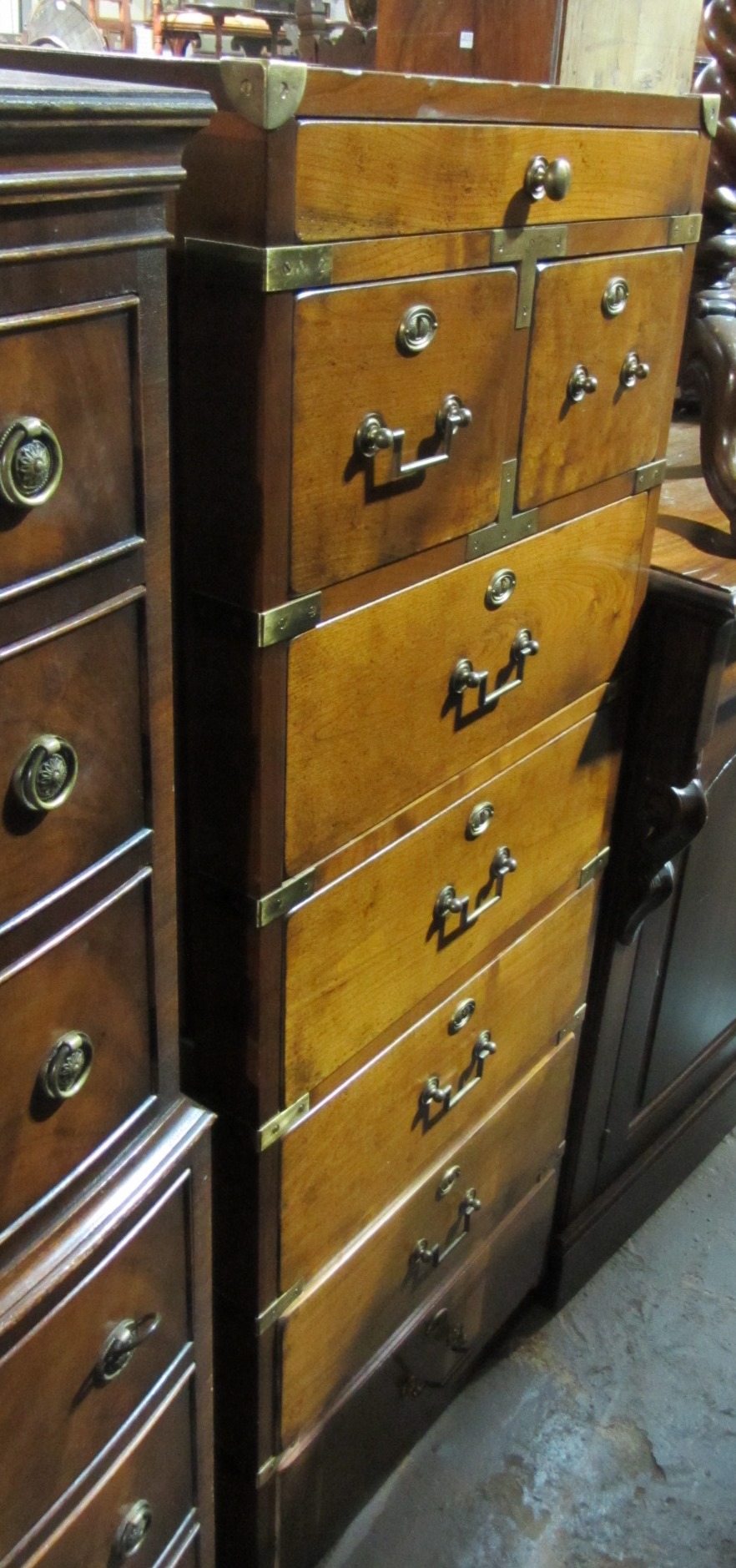 Appraisal: A th century tall walnut chest with an arrangement of