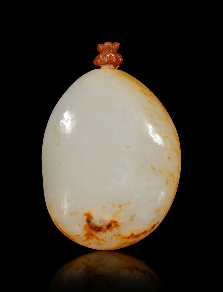 Appraisal: A White Jade Pebble-Form Snuff Bottle Height overall in cm