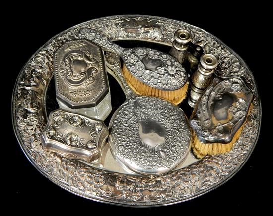 Appraisal: SILVERPLATE with sterling Seven piece vanity set mirrored oval tray