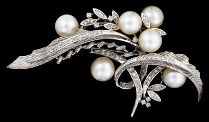 Appraisal: karat white gold diamond and pearl broochmid th century