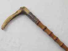 Appraisal: A silver mounted bamboo riding crop with stagshorn handle hallmarked