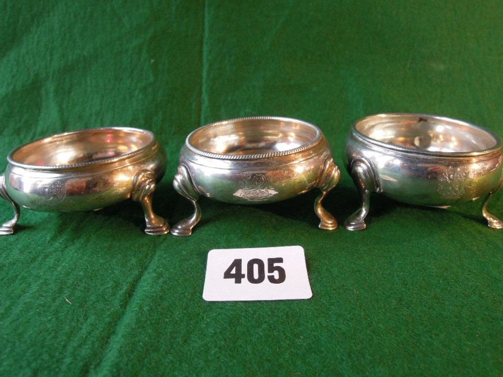 Appraisal: Three Georgian circular salts raised on pad feet dating from