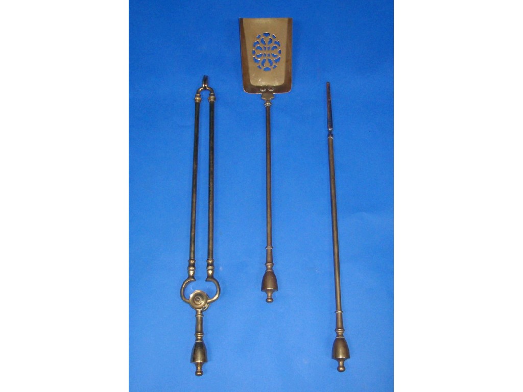 Appraisal: Brass fire irons with urn knops