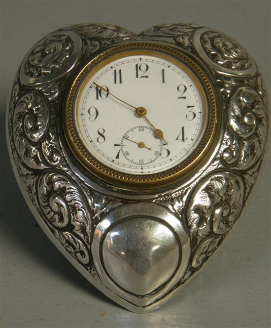 Appraisal: Heart shaped silver table clock Chester high PROVENANCE Thetis Blacker