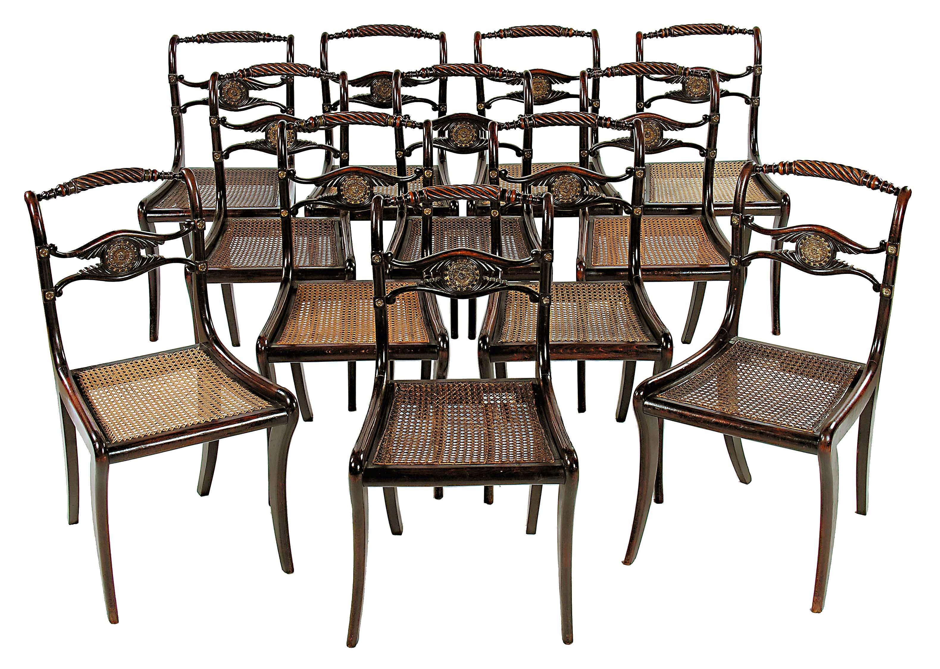 Appraisal: A set of twelve Regency simulated rosewood dining chairs