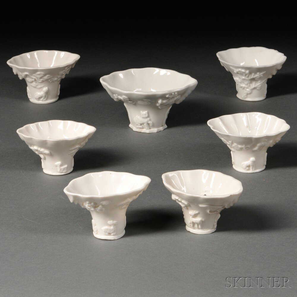 Appraisal: Seven Blanc-de-Chine Libation Cups China Qing Dynasty rhinoceros horn form