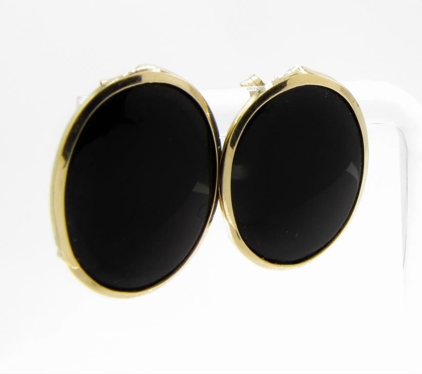 Appraisal: A pair of K yellow gold stud earrings with oval