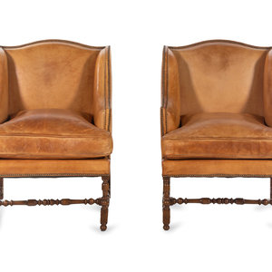 Appraisal: A Pair of William and Mary Style Leather-Upholstered Wingback Armchairs