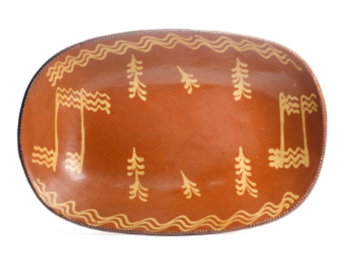 Appraisal: PENNSYLVANIA SLIP-DECORATED REDWARE DOUGH TRAY NINETEENTH CENTURY Decorated with a