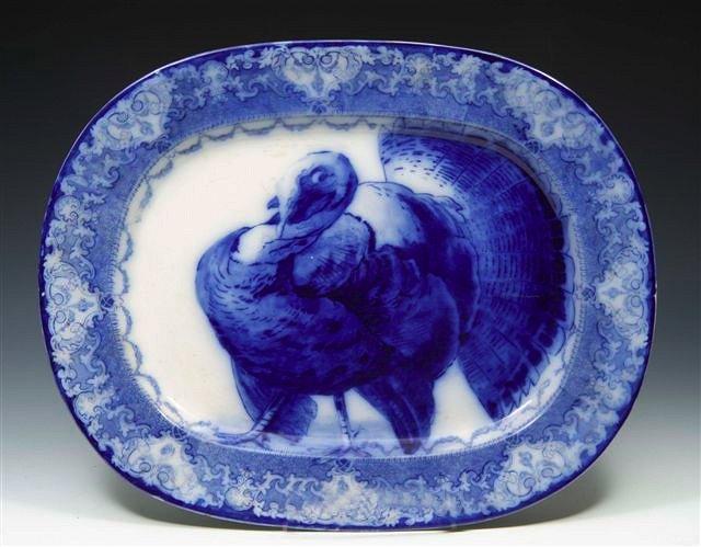 Appraisal: A ROYAL DOULTON BLUE AND WHITE MEAT PLATE decorated a