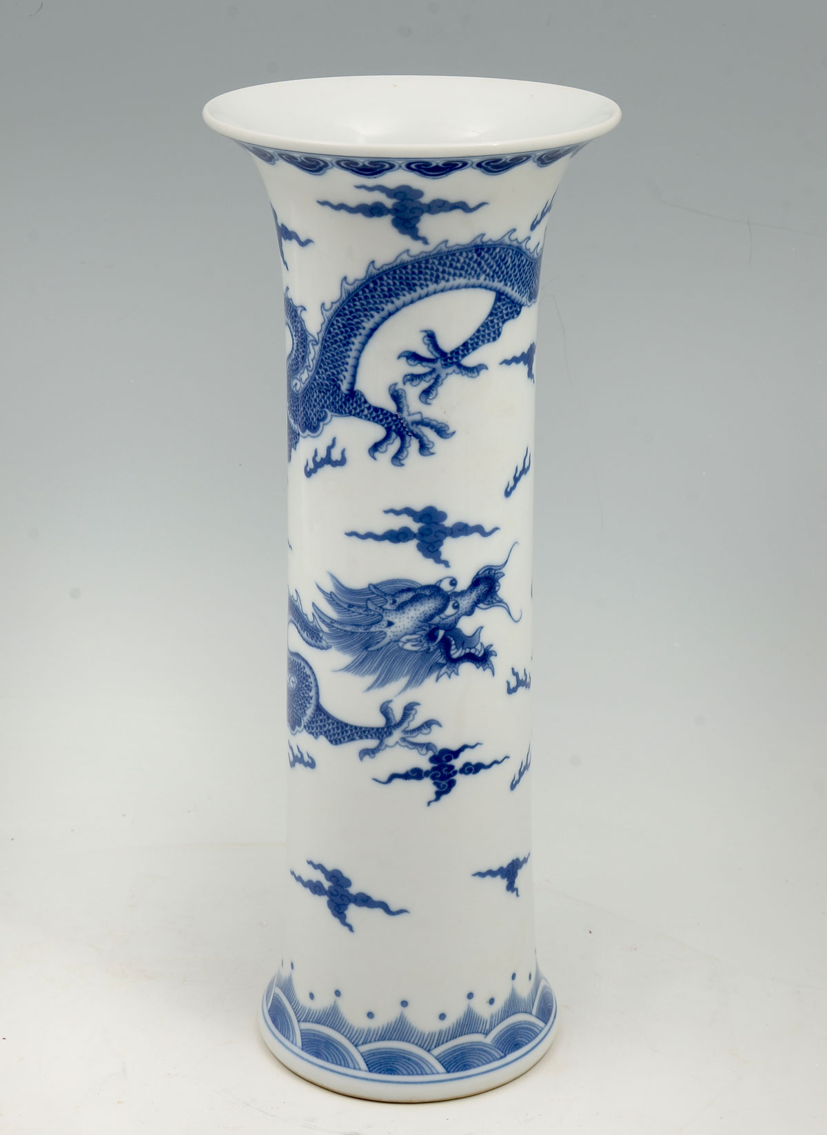 Appraisal: TALL CHINESE BLUE AND WHITE DRAGON VASE Cylindrical Chinese blue