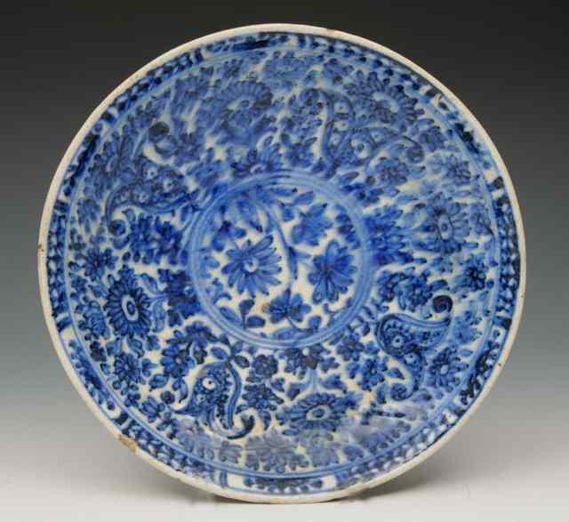 Appraisal: A SAFAVID BLUE GLAZE SHALLOW DISH with allover foliate designs