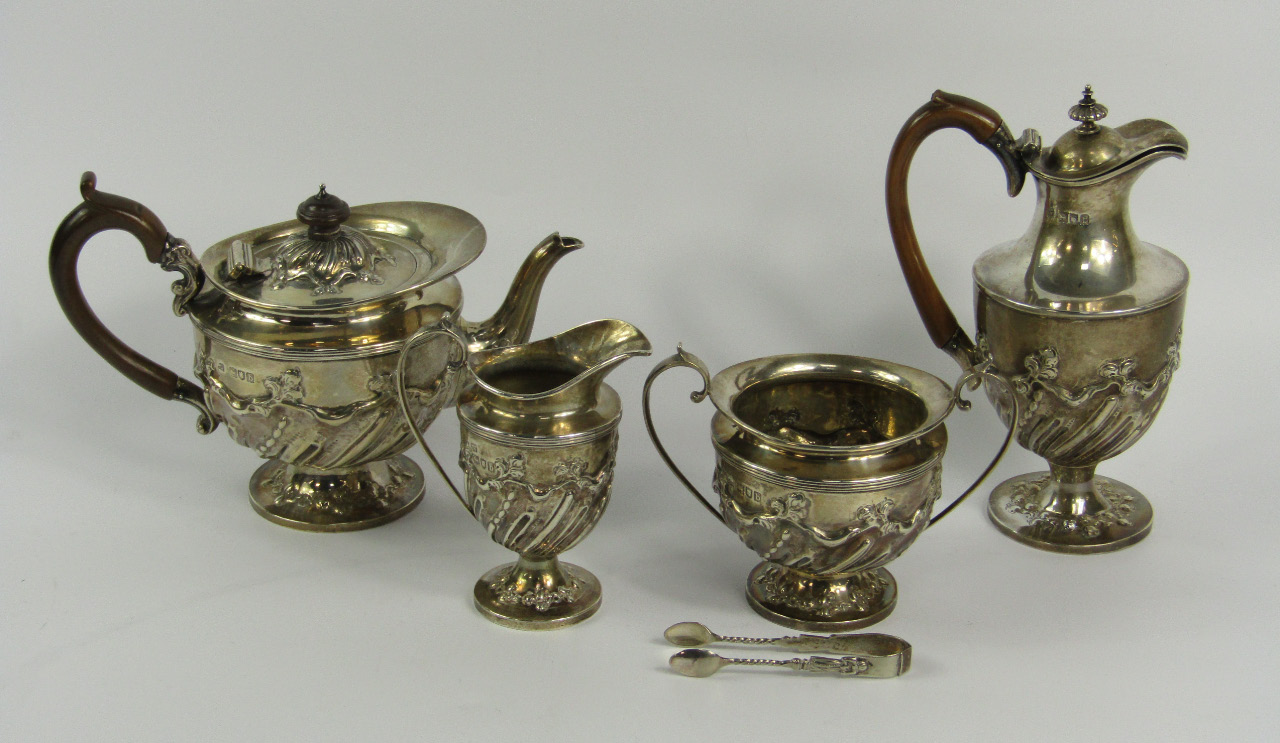 Appraisal: A Victorian silver four piece bachelor's tea set with semi