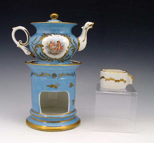 Appraisal: FRENCH PORCELAIN VEILLEUSE Teapot on stand with burner in the