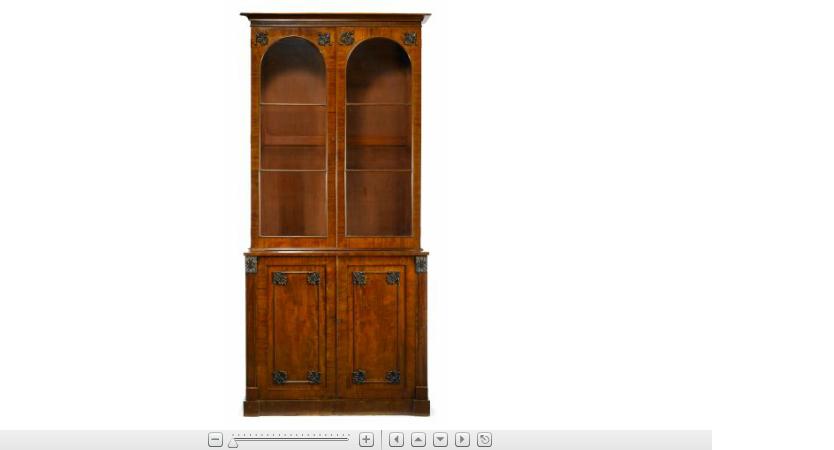 Appraisal: Victorian mahogany bookshelf on cabinetTwo parts the top with molded