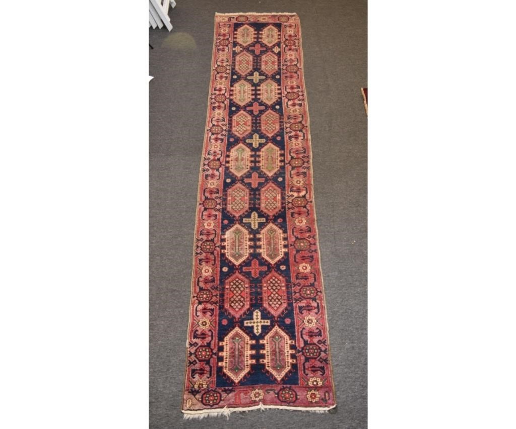 Appraisal: Antique tribal hall runner with geometric medallions and blue field