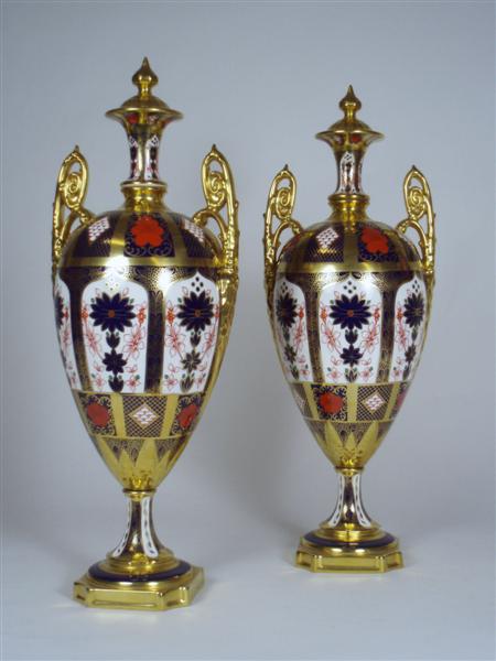 Appraisal: A pair of Royal Crown Derby ornamental urns each in