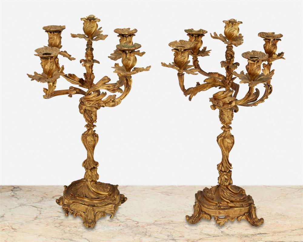 Appraisal: A pair of gilt-bronze candelabra First-quarter th Century Each gilt-bronze