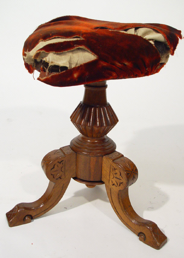 Appraisal: Victorian walnut tripod piano stool with adjustable seat supported by